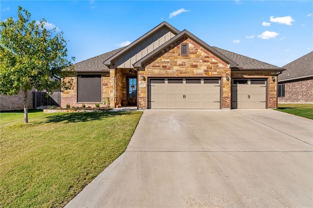 view of front facade featuring a garage and a front lawn