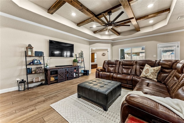 living room with ceiling fan, crown molding, beamed ceiling, and coffered ceiling