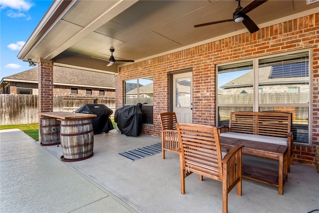 view of patio / terrace featuring an outdoor hangout area, area for grilling, and ceiling fan