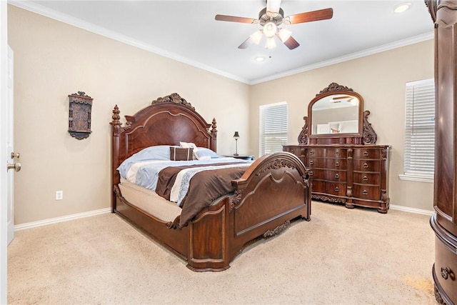 bedroom with ornamental molding, light colored carpet, baseboards, and a ceiling fan