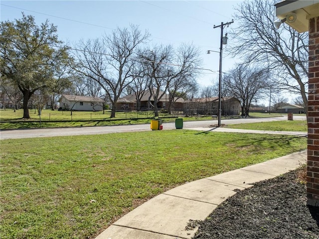 view of yard with a residential view