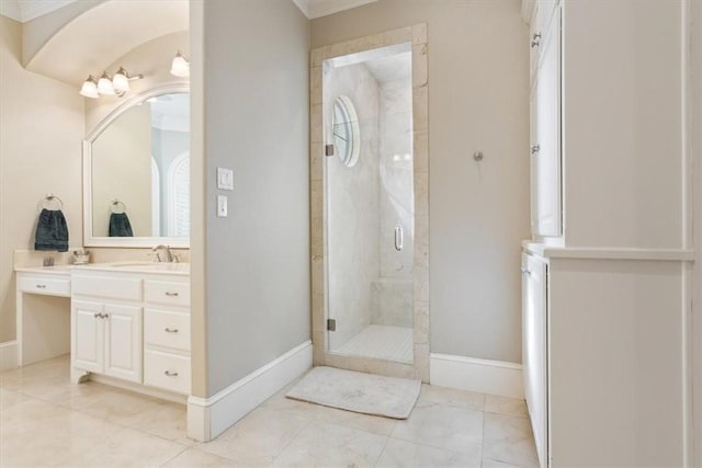 bathroom with walk in shower and vanity