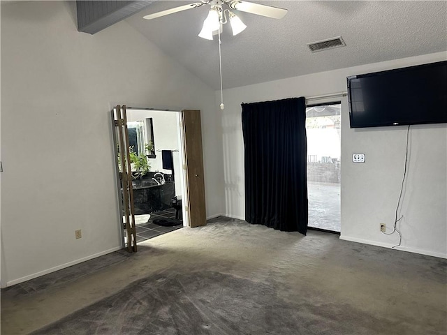 unfurnished room with a textured ceiling, carpet floors, high vaulted ceiling, and ceiling fan