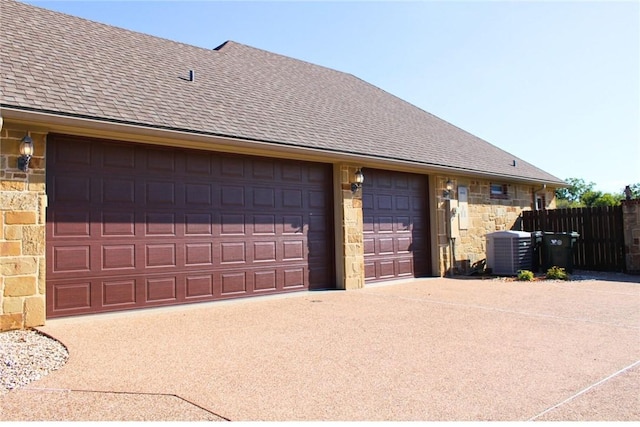 garage featuring central AC unit