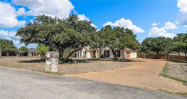 view of front of property with a garage