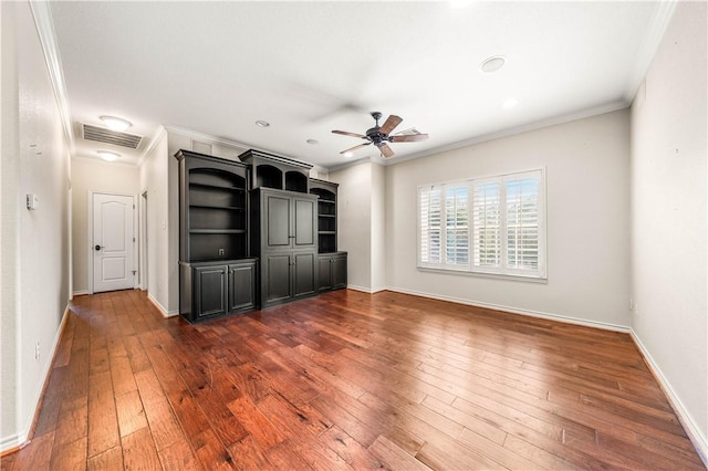 unfurnished living room with dark hardwood / wood-style floors, ceiling fan, and ornamental molding