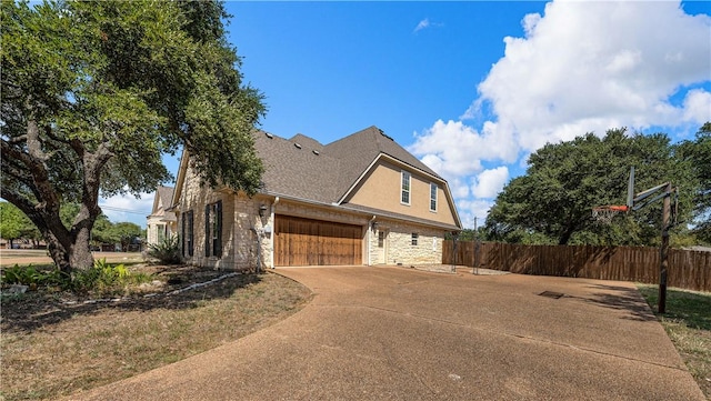 view of home's exterior with a garage