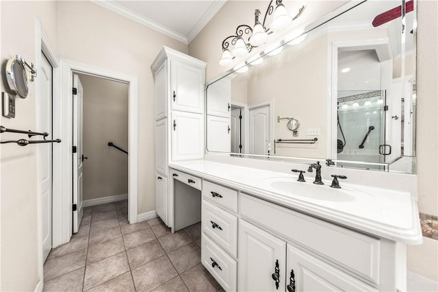 bathroom featuring tile patterned flooring, a shower with door, vanity, and ornamental molding