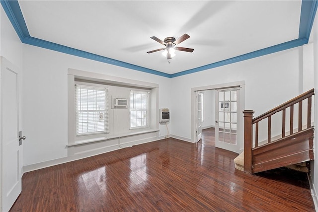 foyer featuring dark hardwood / wood-style flooring, heating unit, ceiling fan, and crown molding