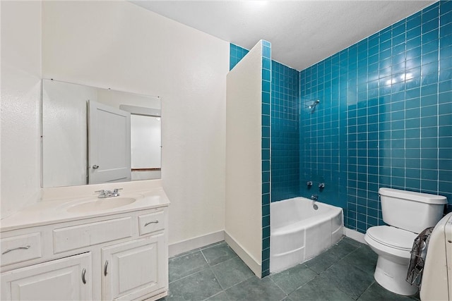 full bathroom featuring tile patterned floors, vanity, tile walls, toilet, and tiled shower / bath