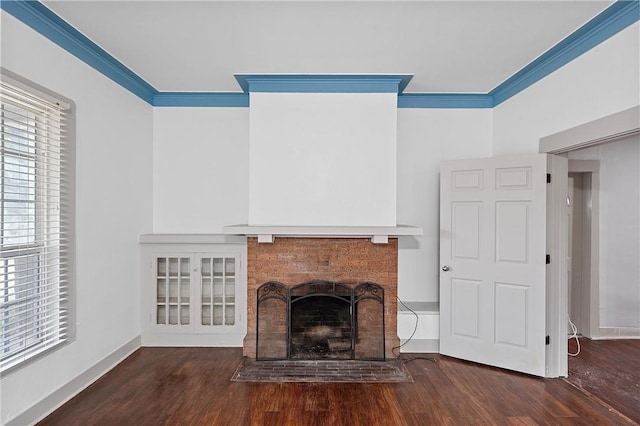 unfurnished living room with crown molding and dark hardwood / wood-style floors