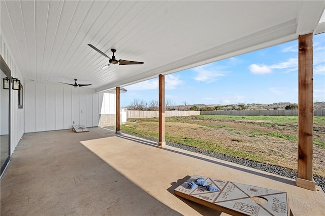 view of patio featuring ceiling fan