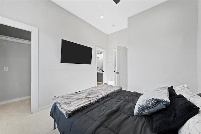 carpeted bedroom with high vaulted ceiling, a closet, and ceiling fan