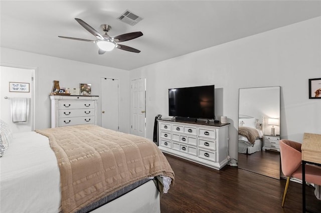 bedroom with ceiling fan and dark hardwood / wood-style flooring