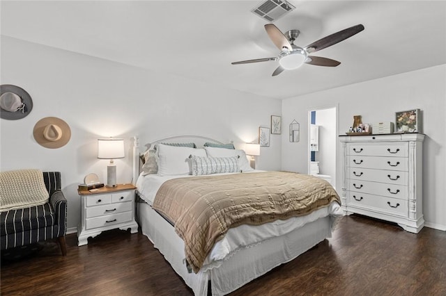 bedroom with ceiling fan and dark hardwood / wood-style flooring