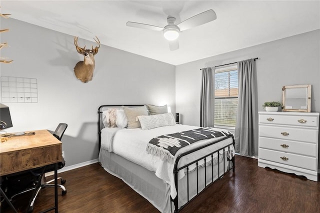 bedroom featuring dark hardwood / wood-style floors and ceiling fan