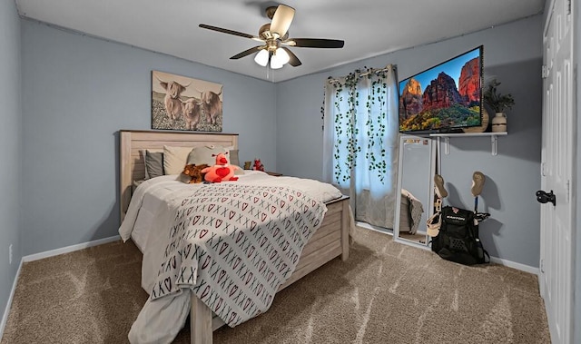 carpeted bedroom featuring ceiling fan