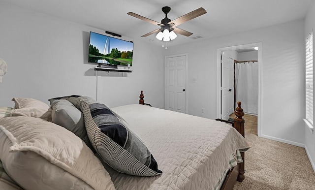 carpeted bedroom with ceiling fan