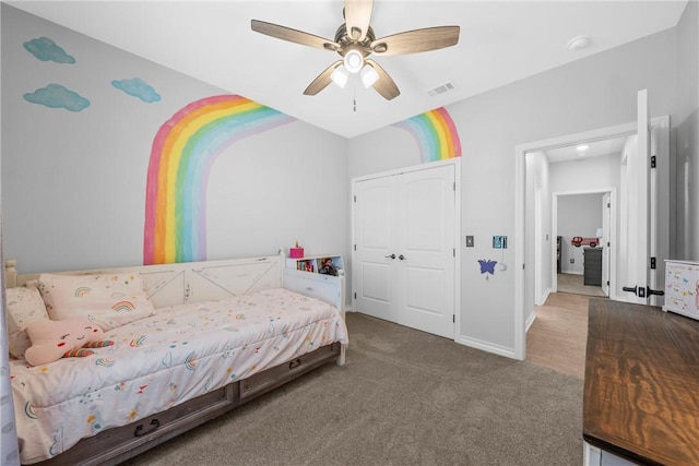 bedroom with ceiling fan, a closet, and carpet