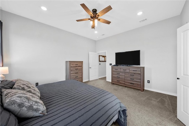 bedroom with dark colored carpet and ceiling fan