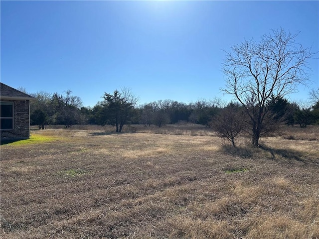 view of yard featuring a rural view