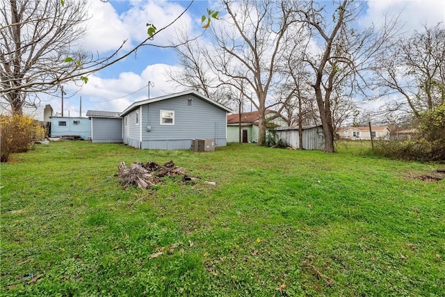 view of yard with central AC