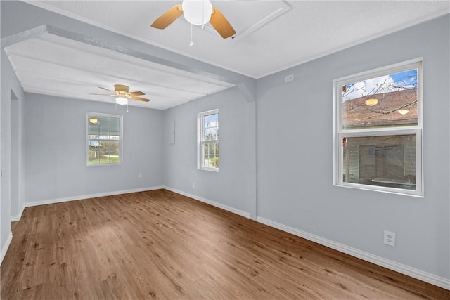 unfurnished room with ceiling fan and light wood-type flooring