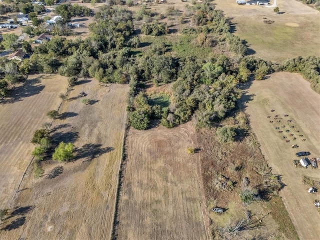 birds eye view of property featuring a rural view