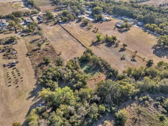 birds eye view of property featuring a rural view