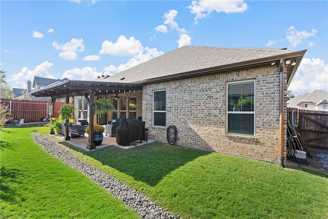 rear view of house with a lawn, an outdoor living space, a pergola, and a patio