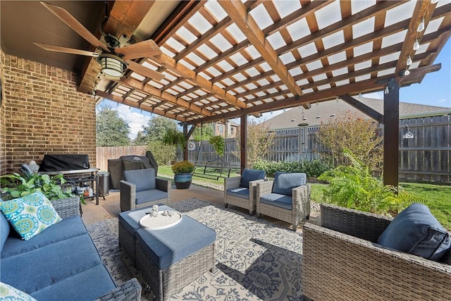 view of patio featuring an outdoor living space, a pergola, ceiling fan, and grilling area