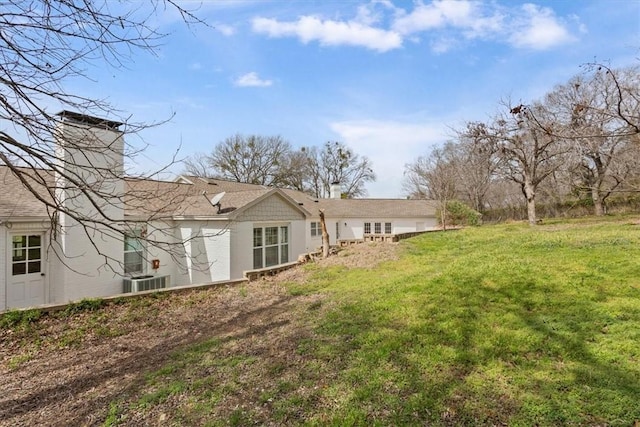 view of yard featuring central AC