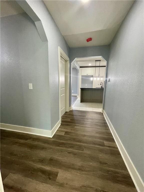 hall featuring dark hardwood / wood-style flooring