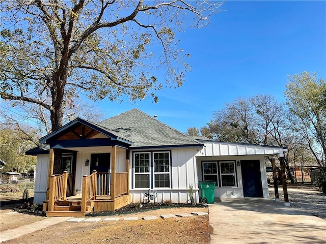 view of front of home with a carport