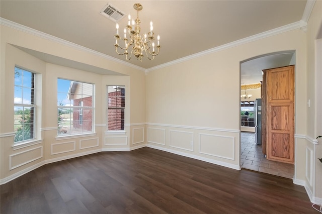 unfurnished dining area featuring a notable chandelier, plenty of natural light, dark hardwood / wood-style flooring, and ornamental molding