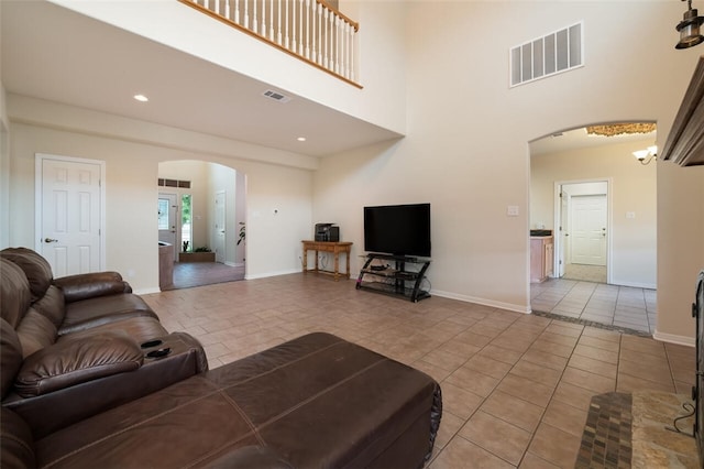 living room with tile patterned flooring