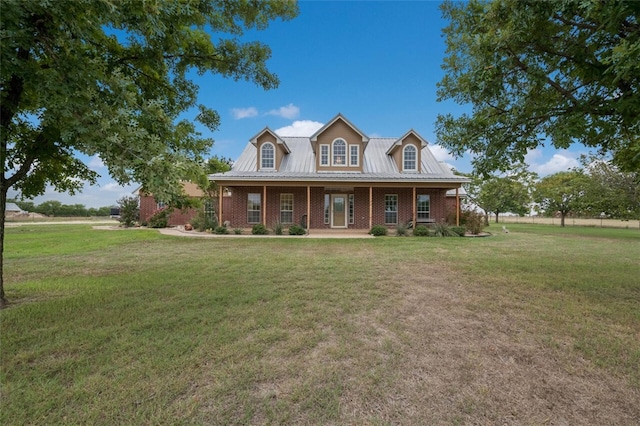 view of front of home with a front lawn and covered porch