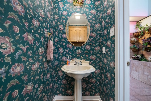 bathroom with tile patterned floors