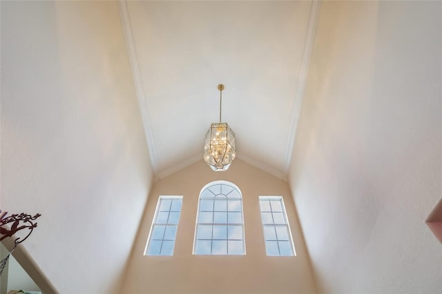 room details with an inviting chandelier and ornamental molding