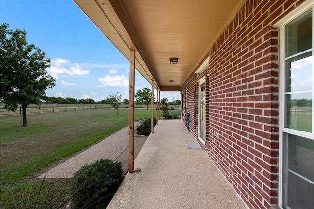 view of patio with a rural view