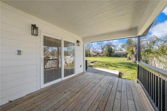 deck featuring a yard