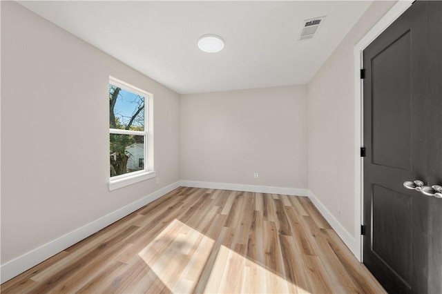 empty room featuring light hardwood / wood-style floors