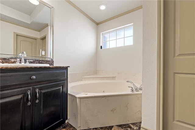 bathroom featuring a jetted tub, recessed lighting, crown molding, and vanity