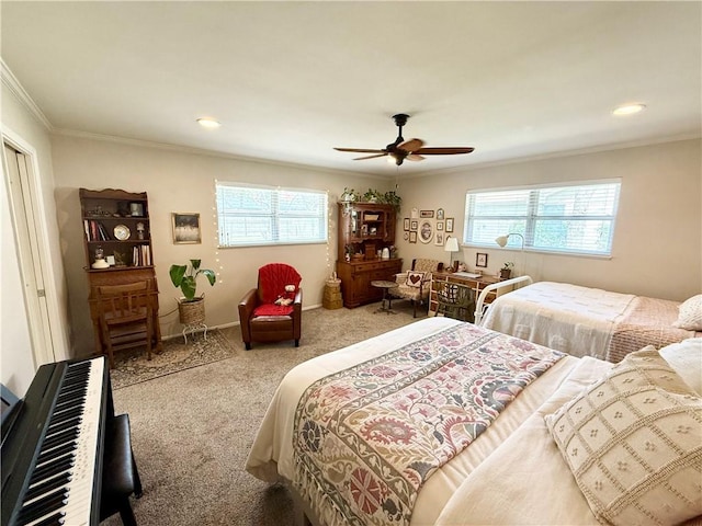 carpeted bedroom with crown molding, ceiling fan, and multiple windows