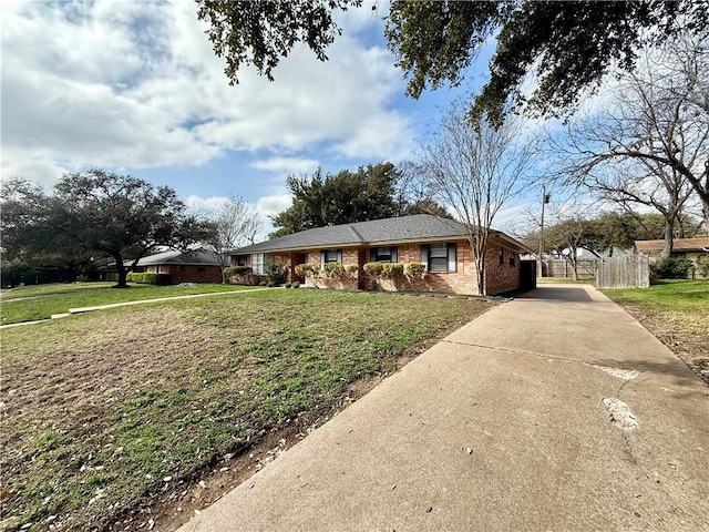 single story home with a front yard