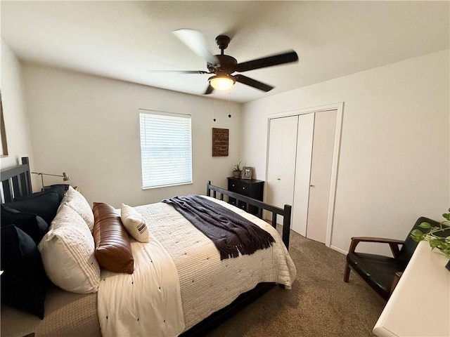 carpeted bedroom with a closet and ceiling fan