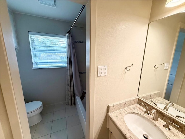 full bathroom featuring shower / tub combo, vanity, tile patterned flooring, and toilet