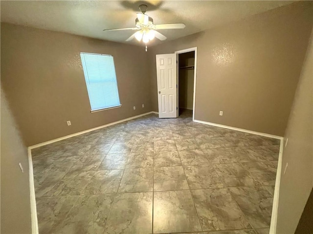 unfurnished bedroom with ceiling fan