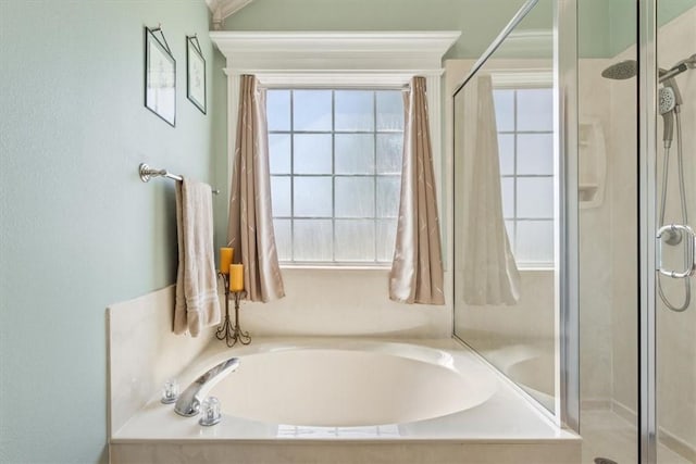 bathroom with separate shower and tub