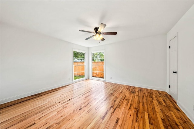 spare room with ceiling fan and light hardwood / wood-style floors